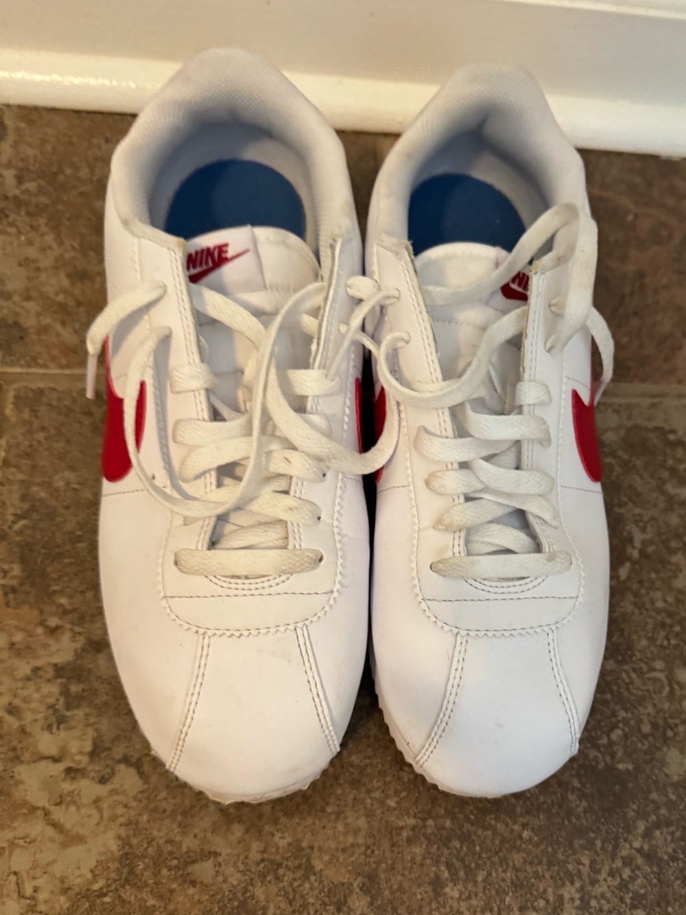 Nike Kids White Sneakers with Red Swoosh